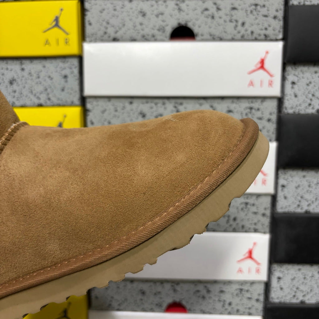 UGG Mini Bailey Bow Ankle Boot – Suede Boot with Cream Shearling Lining, Dark Chocolate Satin Bow & Tan Sugar Sole in Chestnut