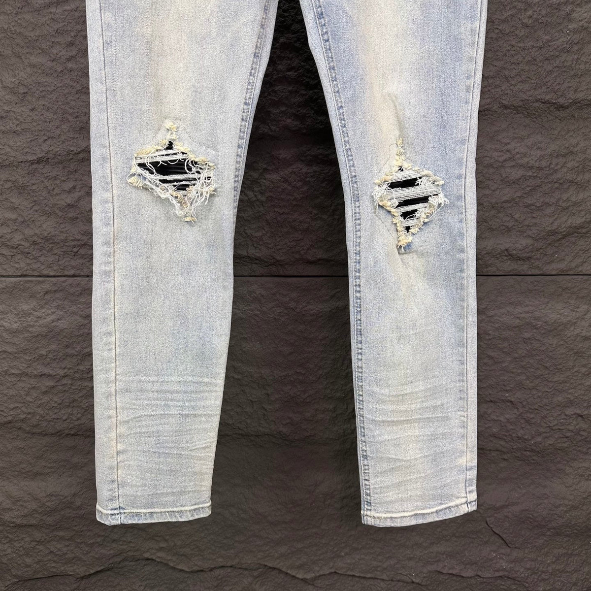 AMIRI Black Ribbed Patch Distressed Slim‑Fit Denim Jeans
