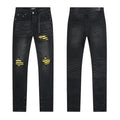 AMIRI Yellow-Backed Distressed Black Jeans