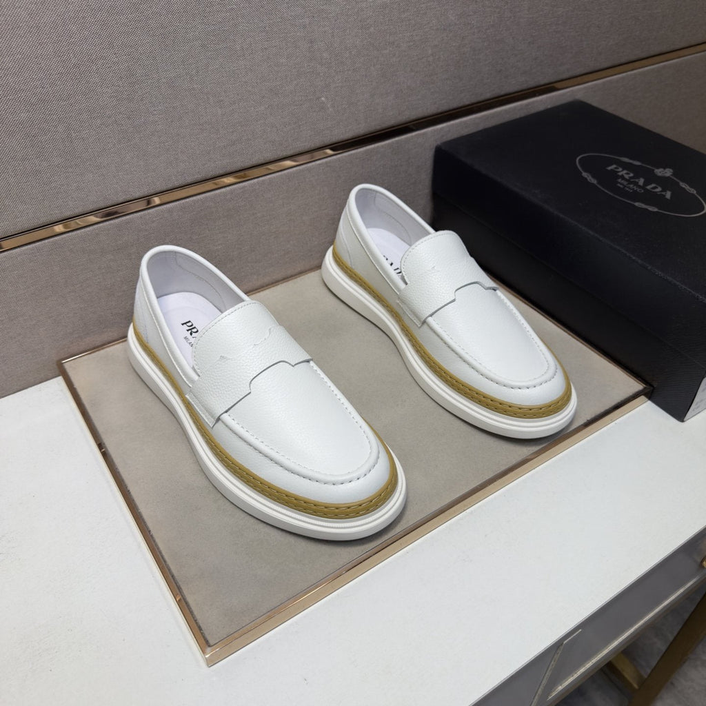 Prada Gold Accent Slip-On Loafers
