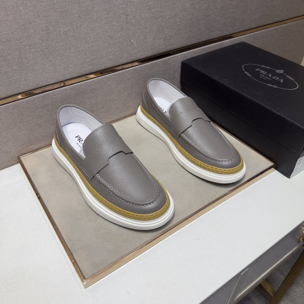 Prada Gold Accent Slip-On Loafers