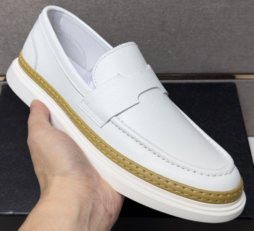 Prada Gold Accent Slip-On Loafers
