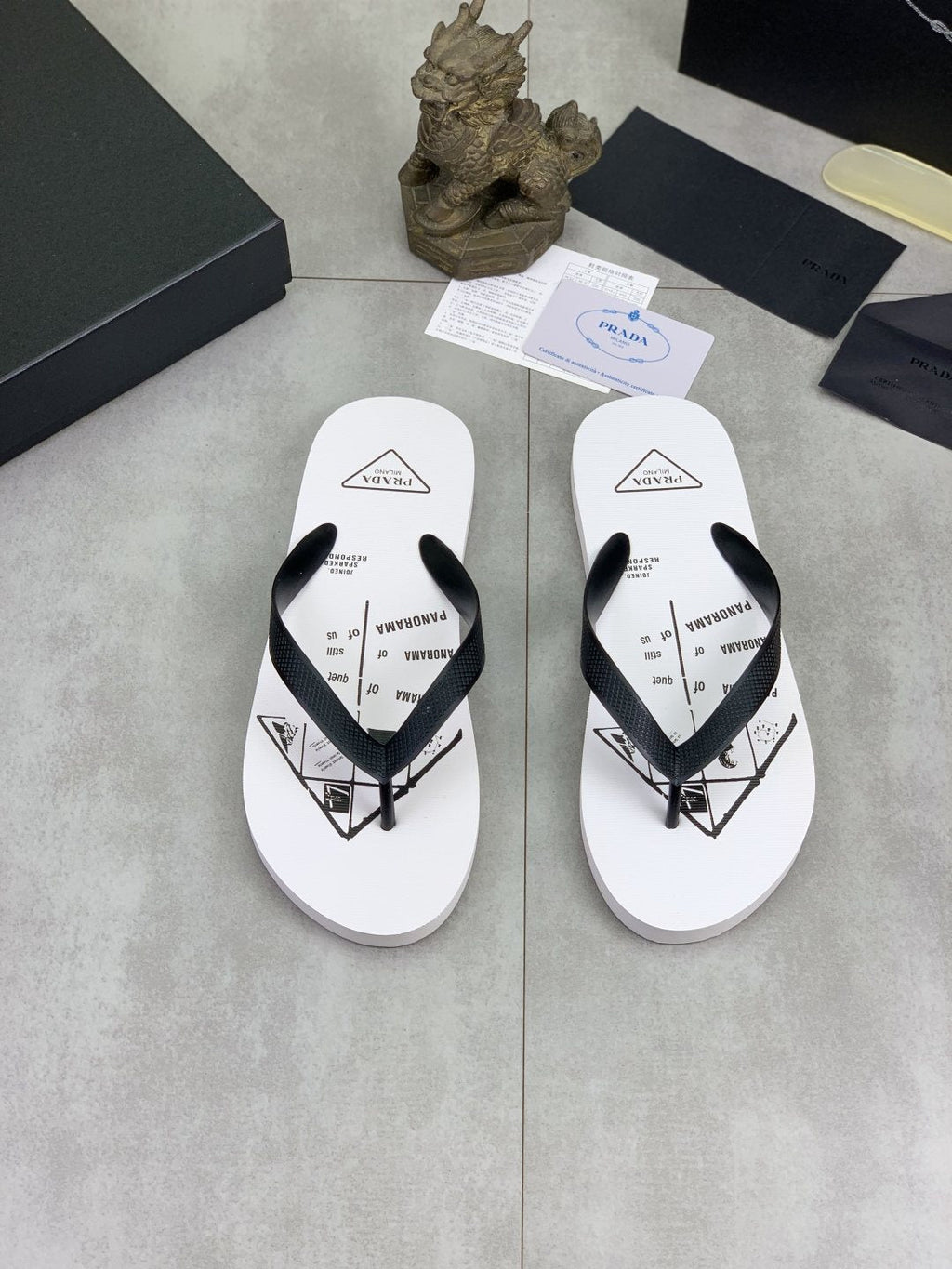 Prada Black Strap White Flip Flops